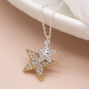 Faux gold and silver plated double crystal inset star necklace