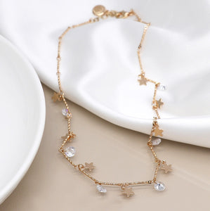 Faux gold multi stars and crystals station necklace